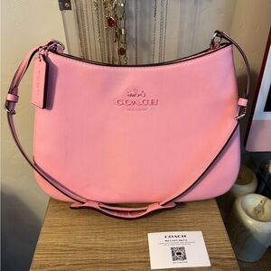 Coach Pink Shoulder Bag with Adjustable Strap and Minimalist Design